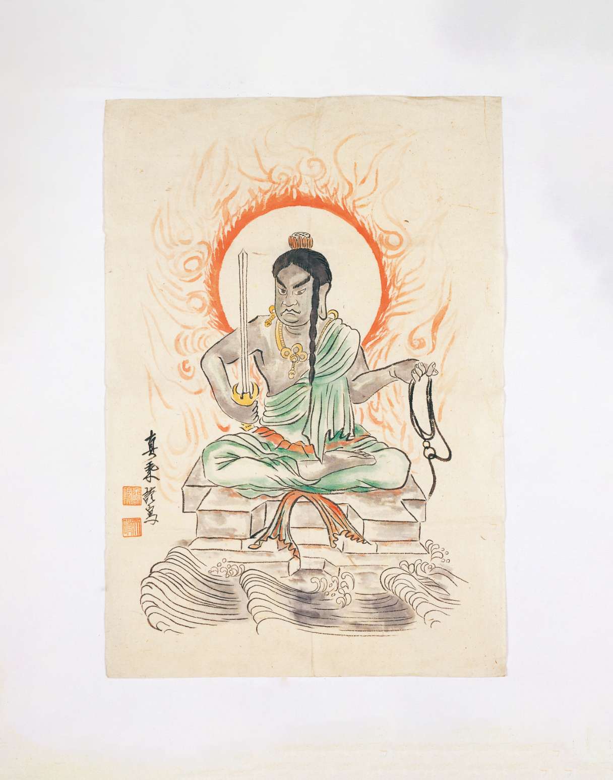 A colorful line painting of a scowling figure haloed in flames, wearing a robe and jewelry, sitting cross-legged, a sword in his right hand and a noose in the left, atop a rock amid churning waves.